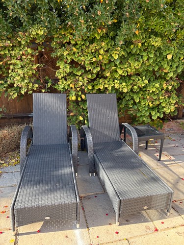 Two black rattan sun loungers - sun,